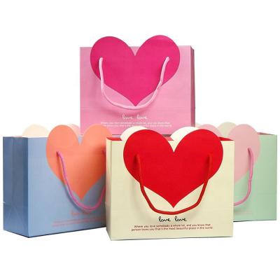 China Factory Direct Sale Paper In Stock Heart Gift Bags Custom Bag With Logo for sale