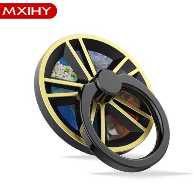 China 360 Degree Rotating Vehicle Wheel Shape Creative Mobile Phone Holder And Spinner Rings 2 In 1 for sale