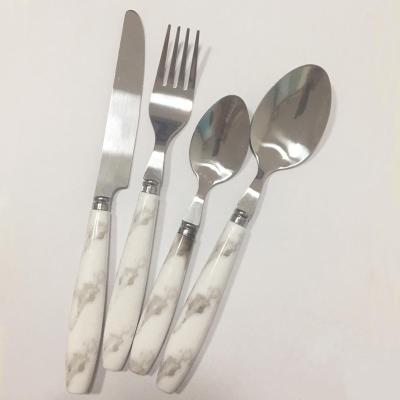 China Jieyang Factory 24pcs Sustainable Cutlery Set With Plastic Handle Stainless Steel Flatware Set for sale