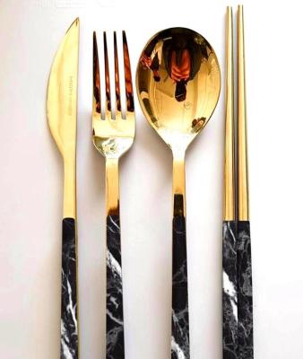 China Sustainable New Stainless Steel Cutlery Set With Gold Plastic Handle Cutlery for sale