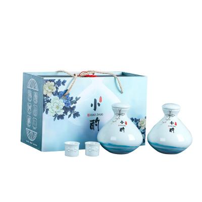 China Smooth Ceramic Creative White Blue White Wine Bottle Gift Box Custom Wine Set for sale