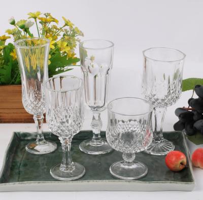 China Easy To Clean Wholesale European Style Embossed Drinking Water Vintage Goblet Wine Glass Transparent Crystal Cup for sale