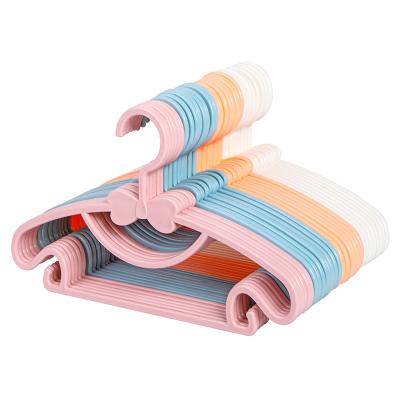 China Multifunctional Modern Wholesale Plastic Baby Kids Coats And Pants Hanger Pink for sale