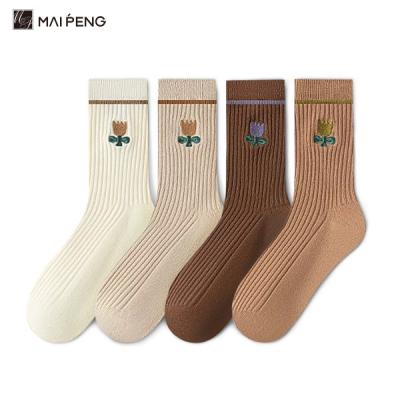 China Solid Color Stripe Breathable Cotton Socks Flower Embroidery Crew Women Socks for sale