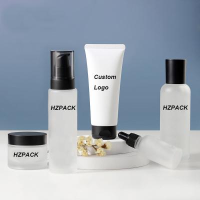 China Customized Biodegradable Glass Cosmetic Bottles Lotion Cream Bottle Toner Cream Bottle Cosmetic Eye Jar Packaging Set With Pump for sale