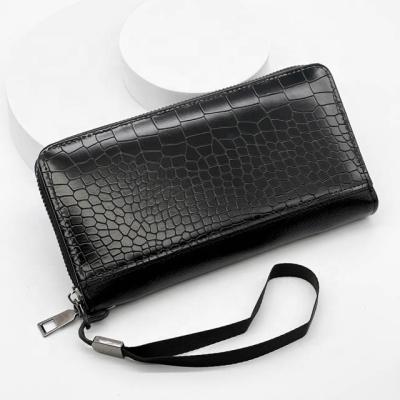 China 2022 Summer New Arrival Vintage Crocodile Money Clip Wallet Zipper Purse Long With Wrist Band PU Leather Phone Wallet Stocks for sale