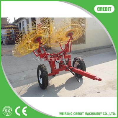 China Agriculture FOR WHOLESALE WHEEL TRACTOR MOUNTED FOLDING ROTARY HAY RAKE for sale