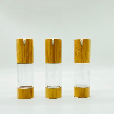 China Do distribuidor mal ventilado mal ventilado de bambu da garrafa 30ml 1.01oz da bomba do ouro recipientes de bambu para cosméticos à venda