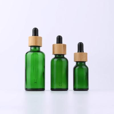 China 100ml 50ml 30 van het de Etherische olieglas van Ml 15ml Groene van het Druppelbuisjeflessen van het de Druppelaarbamboe het Deksel Kosmetische Kruik Te koop