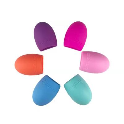 China For commercial & Wholesale Home Use Silicone Washboard Cosmetic Egg Shaped Makeup Brush Cleaning Pad for sale