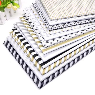 China Recycled materials 20 sheets per bag stars wave warpping available customized by hot stamping dots stripes fabric kraft paper wholesale for sale