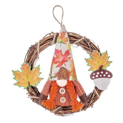 China 2022 Faceless Europe Thanksgiving Day Decoration Maple Leaf Doll Rattan Circle Harvest Hanging Festival Doll Garland for sale