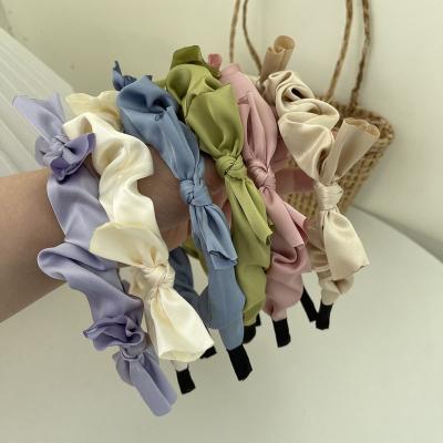 China Beautiful material super friendly satin bow headband women fashion off French retro slim headdress INS headband hair rope hair accessories for sale