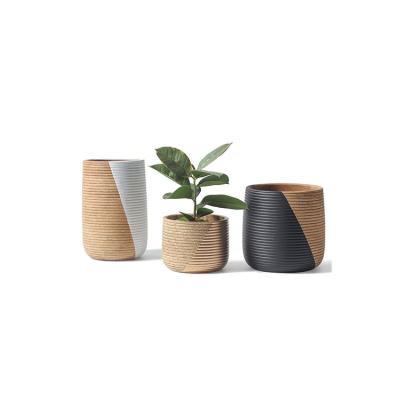 China Hot Selling Minimalist Bonsai Cement Planter Pot Home Decor Embossed Modern Flower Pot for sale