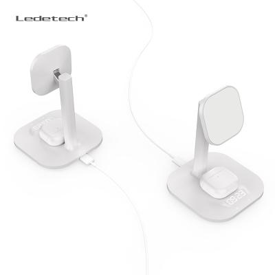 China Magnetic Adjustable Angle Phone Stand Holder Mobile Phone Magnetic Wireless Charging Stands With Earphone Wireless Charger for sale