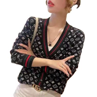 China Anti-wrinkle Amazon vintage jacquard cardigan women's spring and Autumn New Korean version loose single breasted sweater knitted coat for sale