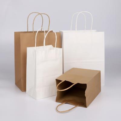 China 2022 Recyclable Kraft Paper Shopping Bags 60g High Quality Stand Up Machine Printing White Kraft Paper Bag for sale