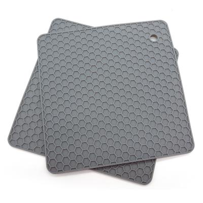 China Universal Pot Non-Slip Pad Cushion Place Mat Honeycomb Tripod Mat Silicone Shaped Square Stocked Silicone Material for sale