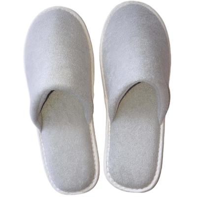 China Super Soft And Comfortable Non Woven Slipper Wholesale Hotel With Nonwoven Bag Disposable Slippers for sale