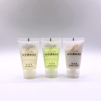 China Hotel Hotel Amenities Bottles Cosmetic Packaging Shampoo Body Lotion Tubes Press 20ml Plastic Disc Top Cap for sale