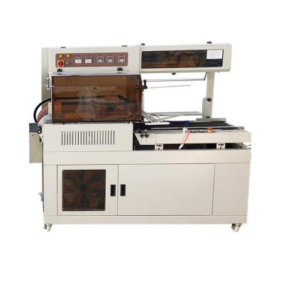 China Food PE Film Sealer Sealing Automatic Tunnel Shrink Wrapping Wrapping Machine For Boxes for sale