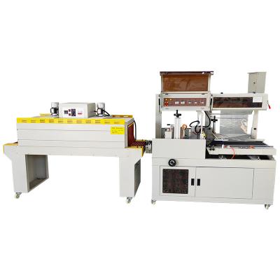 China PE POF Food Wrap Film Shrink Wrapping Machine Auto Plastic Heat Tunnel Wrapping Shrink Wrapping Machine for sale