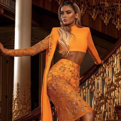 China C2825 Anniversary Waterproof Luxury Outfit Orange Embroidery Beaded Knitted Crop Tops And Mini Skirt Two Pieces Ladies Suit For Party for sale