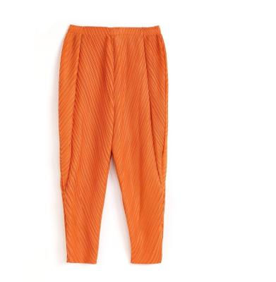 China OEM apparel factory directly elastic waistband 3/4 length fitted pleats please issey miyake pants for sale