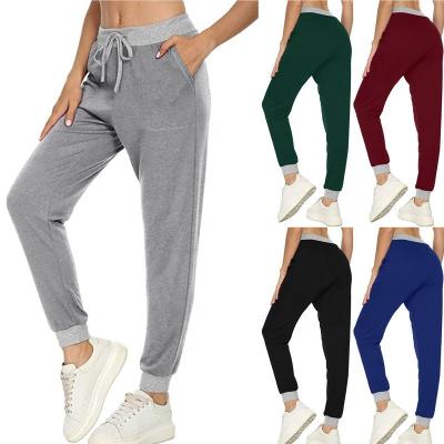 China 2022 Product 2022 Product QUICK DRY Trending Casual Women's Pants And Trousers Solid Color Drawstring Outdoor Sportswear Tracksuit for sale