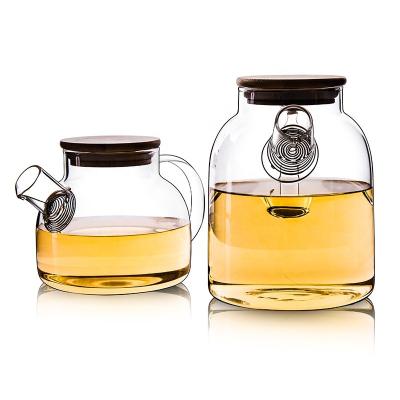 China Viable Wholesale Handmade Glass Jug High Borosilicate Glass Drinking Glass Heat Resistant Water Pitcher With Bamboo Lid for sale