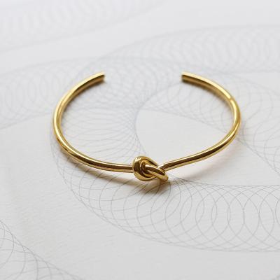 China High polished open titanium steel knot bracelet 18k gold plating Yiwu Meise YY516 easy style CIA twisted knot bracelet for sale