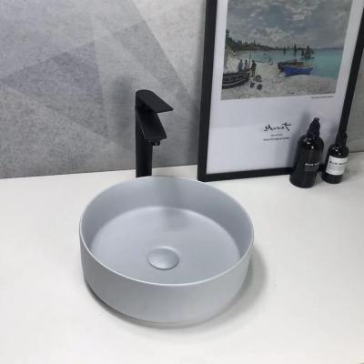 China New Design Simple Bathroom Countertop Mini Wash Basin Sink Ceramic Hand Wash Basin Sink Bathroom Sink for sale