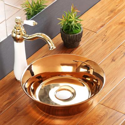 China Easy Clean Luxury Small Freestanding Wash Sink Gold Ceramic Silver Rose Basin Bathroom for sale