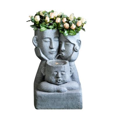 China Minimalist 76cm Height Family Nordic Style Happy Face Artistic Garden Water Fountain With Flower Pot for sale