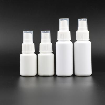 China Wholesale Round Shape White Plastic Medicine Personal Care 30ml HDPE Disinfectant Bottle With Spray Cap for sale