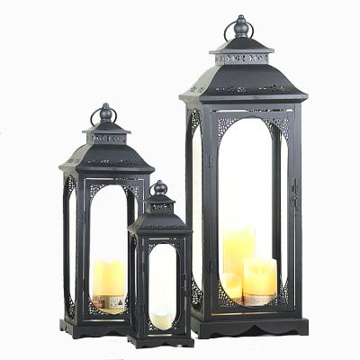 China Creative Romantic Wind Lantern Candle Holder Factory Direct Selling Wrought Iron Metal Home Windproof Glass Lantern Candle Holder for sale