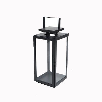 China Home Customizable Retro Glass Floor Metal Sconce Floor Lantern Outdoor Windproof Lantern for sale