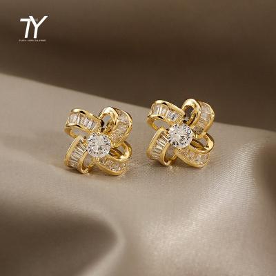 China Wholesale Trendy Fashion Taoya Copper Alloy Windmill Zircon Stud Earrings Party Women's High Quality 18K Gold Jewelry Stud Earrings for sale