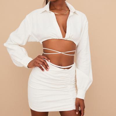 China High Quality Breathable Ladies Two Piece Skirt Set Sexy Solid Color Crop Top Mini Wrap Skirt Women Strappy for sale