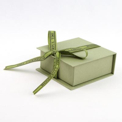 China Recycled Materials Custom Green Fold Box Rigid Gift Jewelry Packaging Box with Ribbon for Lovers Durable for sale