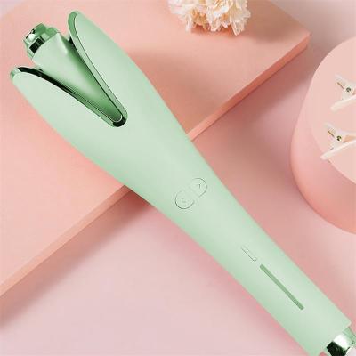 China Hot Sale Home Portable Ceramic Barrel Hair Curler Automatic Rotating Hair Curling Iron For Women for sale