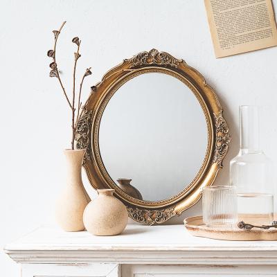 China Classic Luxury Antique Wall Mirror Decorative Hanging Oval Mirror For Bathroom Gold Make Up Mirror for sale