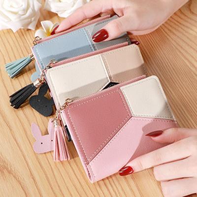 China ZX1054 factory direct sales 2022 Korean version tassel simple and soft wallets ladies cartoon zipper waterproof short wallet for sale