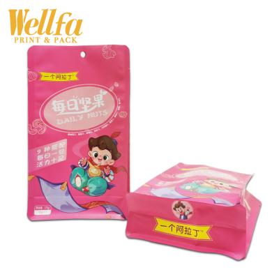 China Custom Logo Pouches For Nut Packaging Glossy Foil Barrier Hole Hole Flat Bottom Pouch With Teardrop for sale