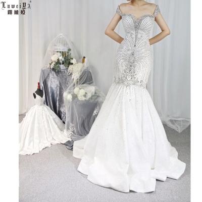 China Fashion Anti-Static Design Gorgeous Luxury Mermaid New Lace Up Ghana Wedding Dress Women Party Sexy Bandage Dress In for sale