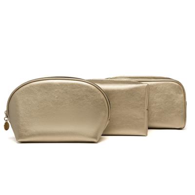 China Zipper Best Selling 3 Pcs Gold Cosmetic Make Up Bag Waterproof Shell Bag With Zipper For Women for sale