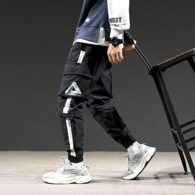 China New Breathable Hot Sale Men Loose Straight Falling Feeling Big Pocket Harem Pants Leisure Beam Foot Cargo Pants Wild Handsome for sale