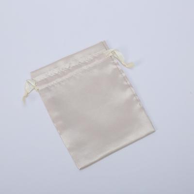 China Custom Color Drawstring Pouch Jewelry Bag Small Luxury Drawstring Gift Storage Package Pouch Expansion Bag With Logo Jewelry Packaging Printing Satin Bag for sale