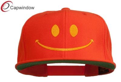 China Embroidered Flat Brim Baseball Hats with Orange Big Smiley Face for sale