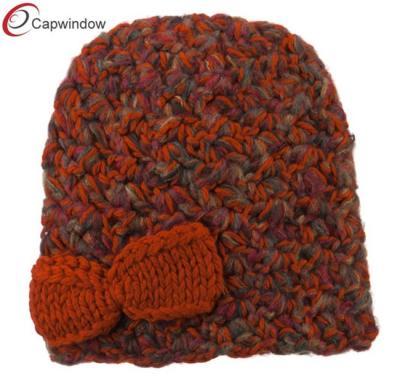 China Bow Mix Yarn Acrylic Knit Winter Hats , Orange Women Fashion Warm Cap for sale